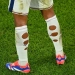 Footballeurs aux chaussettes trouées : découvrez la surprenante vérité derrière ce phénomène !